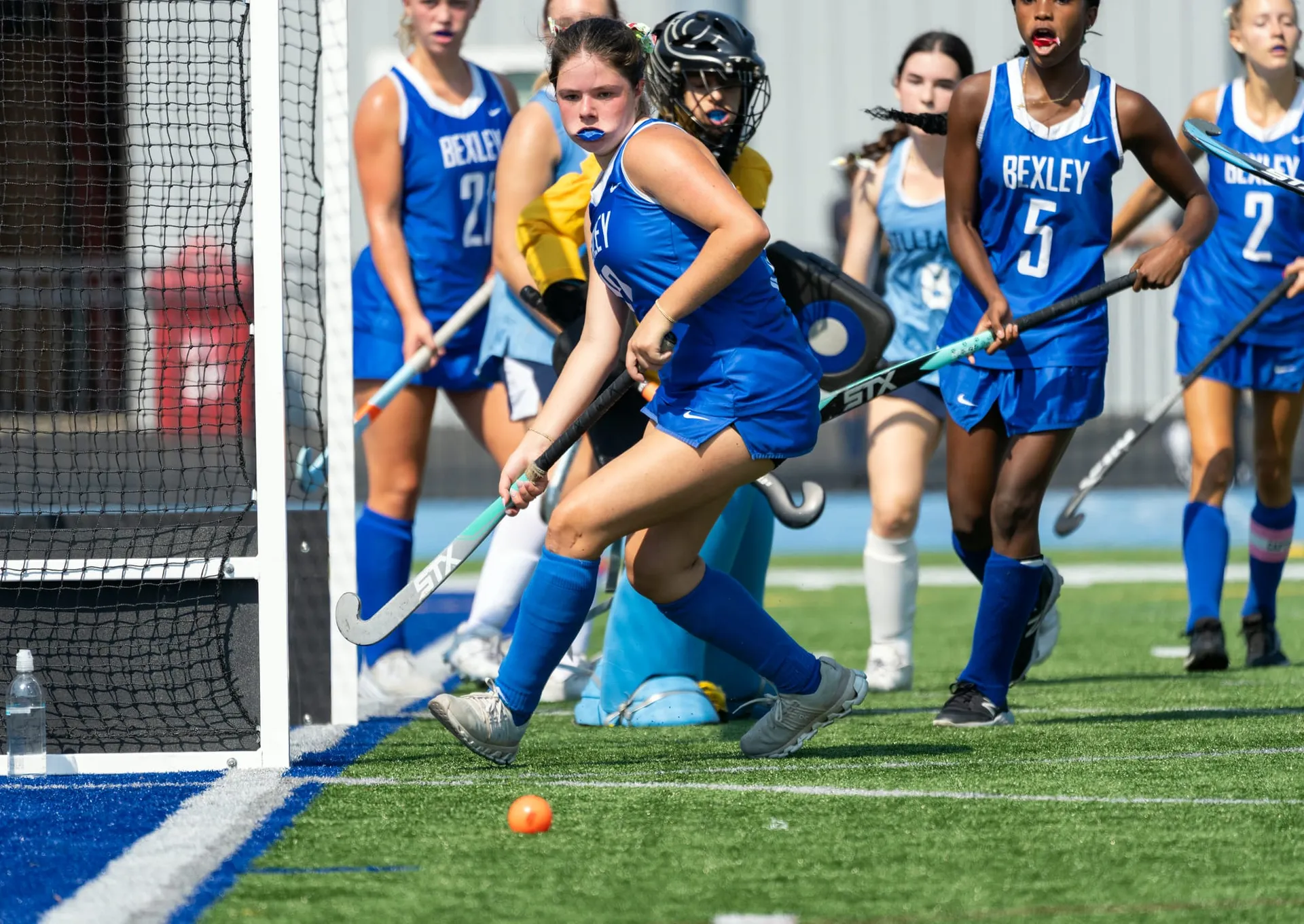 A goal-line clearance during a Bexley field hockey match